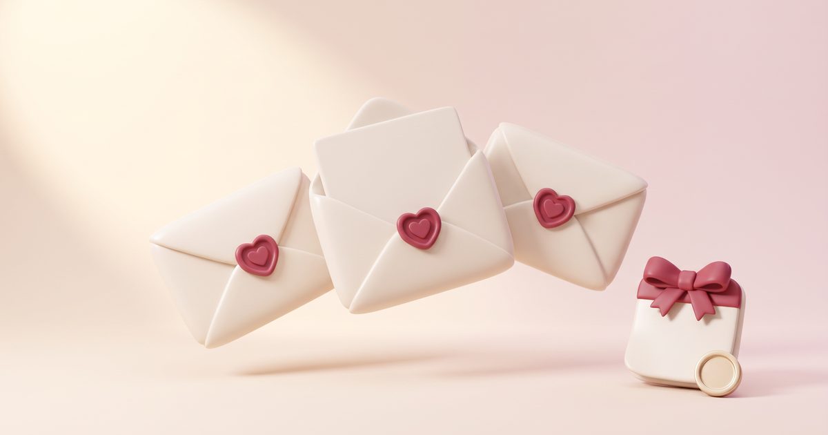 Three cream envelopes with rose heart seals floating in an arc